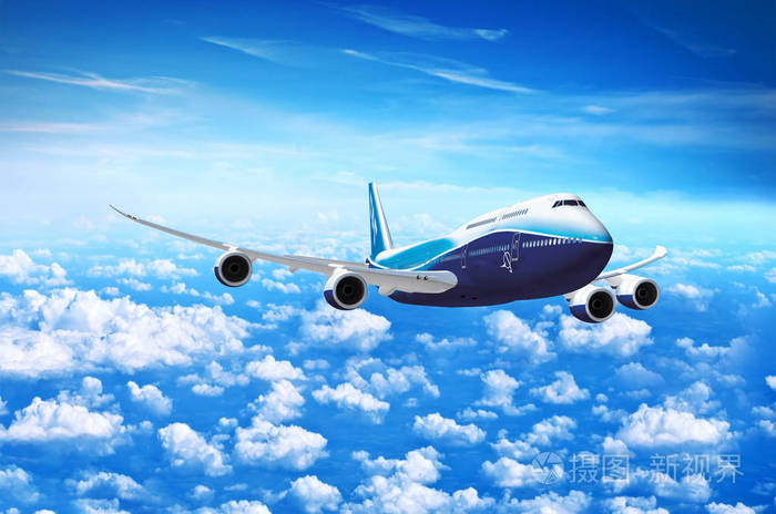 白色客机正在飞行飞机在蓝天上高高地飞过云层飞机侧视图