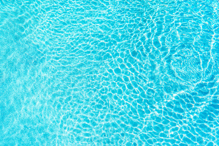 抽象泳池水面和背景的阳光反射图片