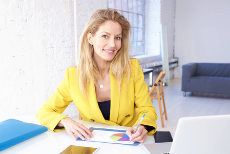 executive mature businesswoman working on new finan