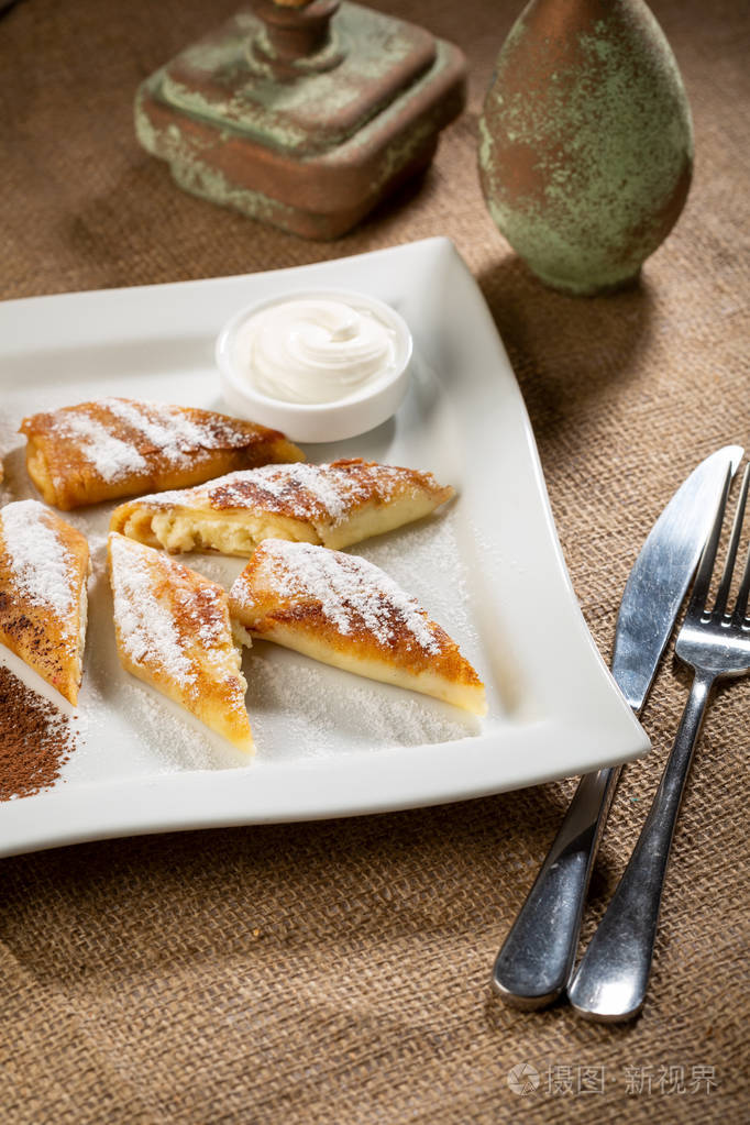 Crepes with cottage cheese and cream 