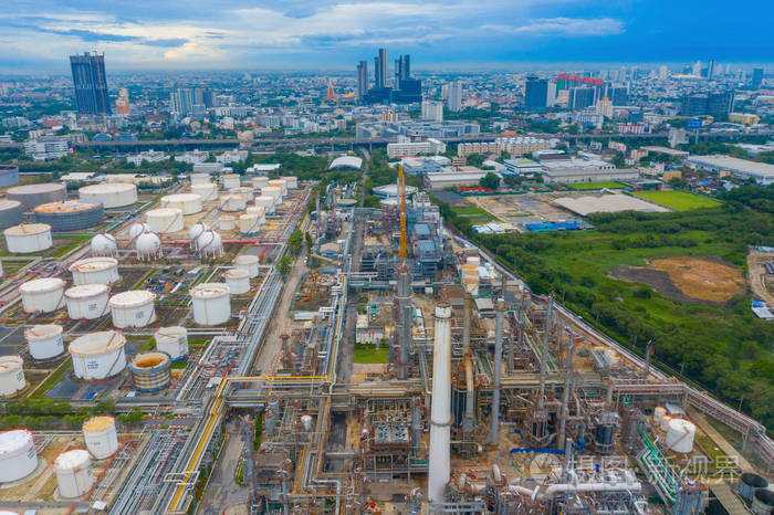 Aerial view of petrochemical oil refinery and sea in industrial 