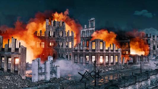 二战轰炸战后被摧毁的城市燃烧的建筑废墟照片