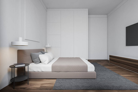 带电视的白色卧室侧视图照片