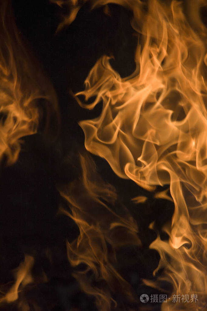 旗帜背景的火焰纹理燃烧火焰的概念图像黑色背景上完美的火焰粒子特写