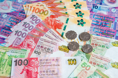 hongkong dollar money banknote with coins 照片