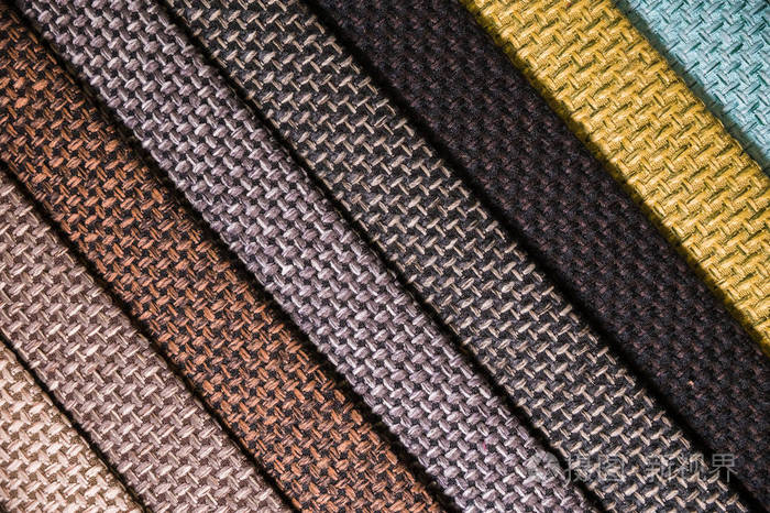 家具和服装装潢的色彩鲜艳的布料样品不同颜色的织物抽象条纹的特写