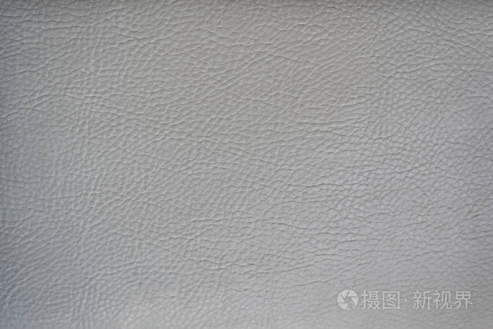 浅灰色皮革光滑表面背景和纹理