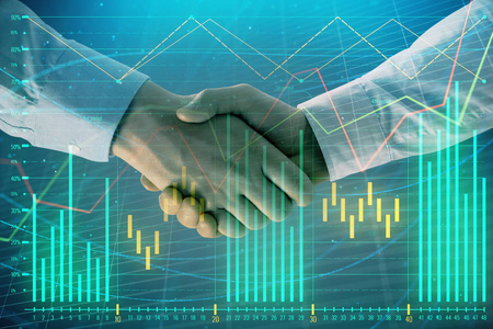 企业团队激励握手两位商人握手,在抽象背景下多次曝光外汇图形.