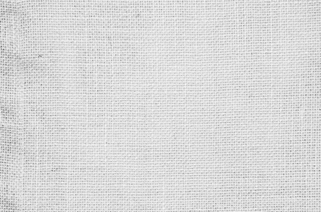 天然复古亚麻粗麻布编织,旧米色地毯背景.照片