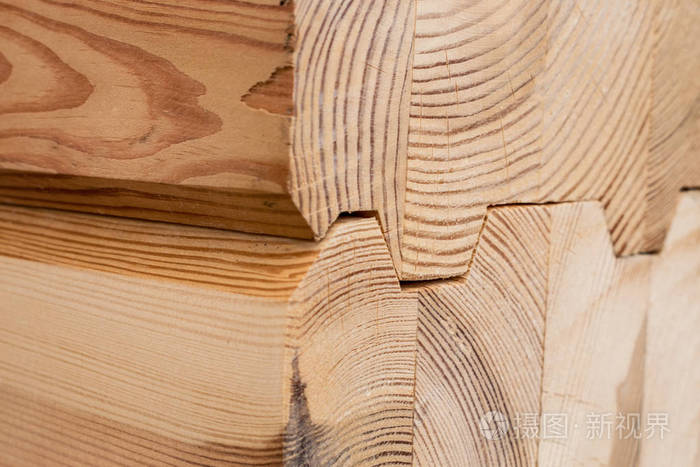 Wood Glued timber close up. Wooden grain timber end background. 