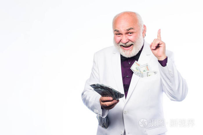 富裕和幸福.储蓄系统人寿保险.老人拿着现金.赚取金钱利润.现金担保.