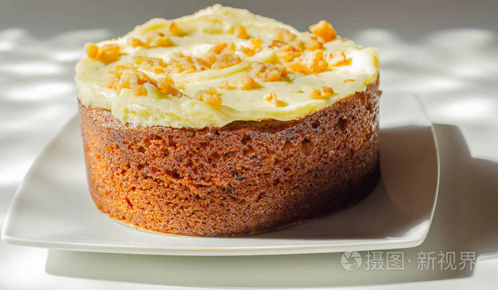 Carrot cake filled and topped with cream cheese buttercream and 