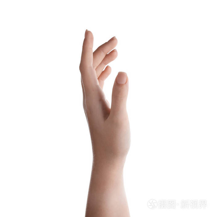 白色背景上拿着东西的女人手的特写