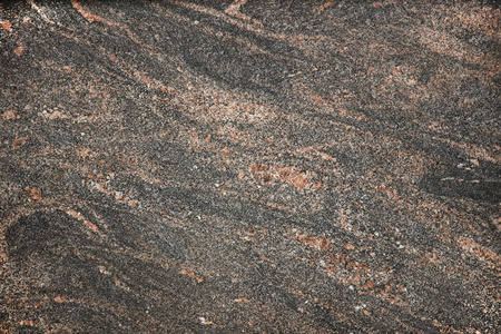 这个盘子是用棕黑色的大理石做的.光滑的纹理设计和装饰.