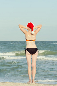 女孩采用游泳衣是be的三单形式英文字母表的第19个字母tand采用g向指已提到的人海滩采用SociedeAnonimaNaci
