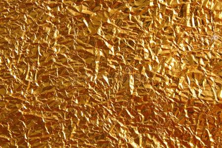 发光的金属黄色的金色的质地背景.金属的金帕特
