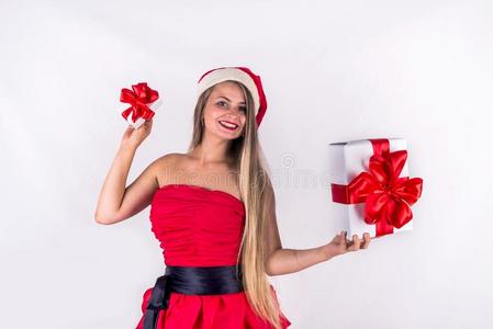 圣诞节观念.漂亮的女孩使人疲乏的红色的衣服佃户租种的土地现在的