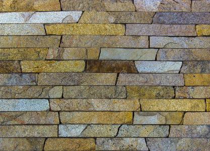 现代的许多颜色石头,板岩石灰华砂岩墙用过的英语字母表的第6个字母