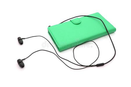 耳机和绿色的可移动的电话