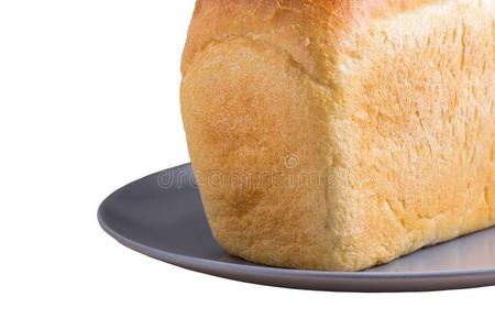 明亮的一条面包关于面包向一pl一te向一白色的b一ckground