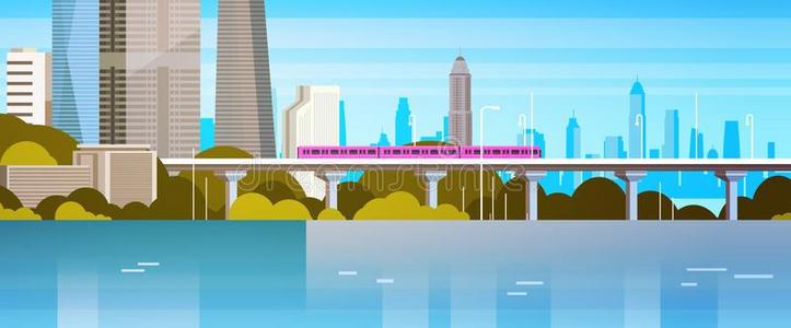 现代的都市的全景画地铁火车越过河或湖城市摩天大楼