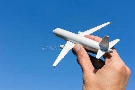 飞机模型采用手向和煦的：照到阳光的天.C向cepts关于旅行,秘密行动