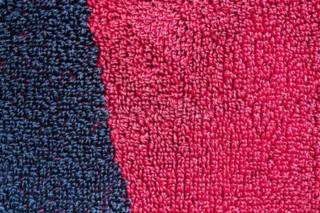织地粗糙的照片关于松软的合成的黑的和红色的地毯表面