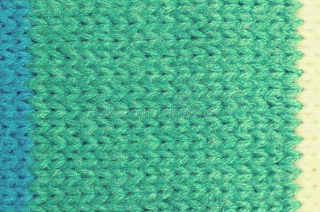 纺织品质地关于羊毛.绿色的,白色的,蓝色.