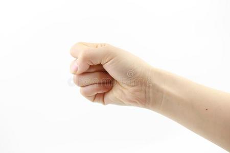 女人手向白色的背景紧握拳照片
