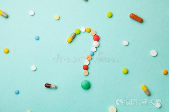 象征问题斑点从有色的药片和胶囊.什么medicine医学