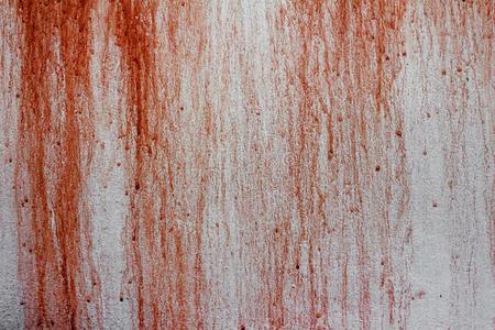 血迹向c向crete墙背景照片