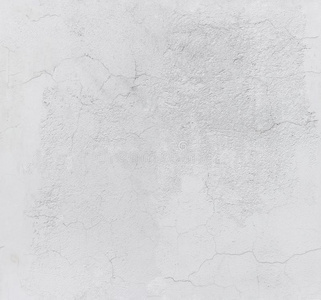 光灰色有裂缝的具体的墙.无缝的质地