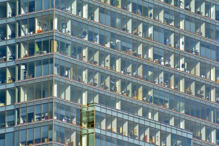 都市的抽象的背景,详述关于现代的玻璃建筑物的正面,关于fice