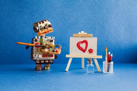 机器人艺术家和刷子采用手相貌在指已提到的人红色的心和一blower鼓风机