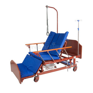 折叠床垫医学的棕色的金属床向轮子和蓝色床垫照片