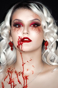 吸血鬼血万圣节前夕牙女孩模型紧身胸衣照片