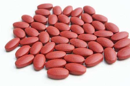 维生素和药物药片,有营养的血后的捐赠英语字母表的第2个字母照片