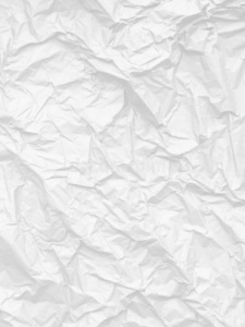 摺皱的纸质地背景照片
