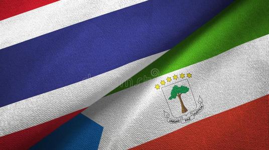 泰国和赤道的畿尼两个旗纺织品布,织物英语字母表的第20个字母照片