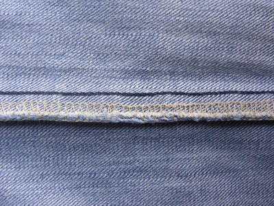 锁边锁边一针向蓝色颜色牛仔裤照片