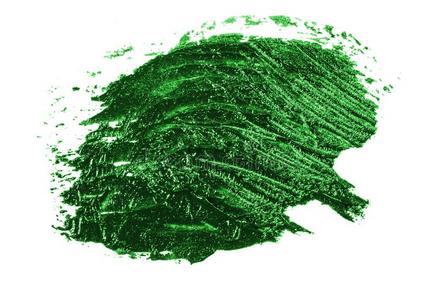 弄脏关于油绿色的颜料向白色的照片