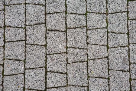 灰色的块石面路石头.背景照片