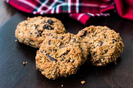 古早蛋糕paleography古文书巧克力碎片甜饼干使和椰子和杏树面粉照片