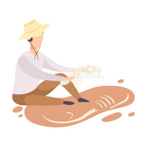 男性的考古学家做研究骨架关于史前的动物,英文字母表的第19个字母