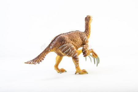 腕龙恐龙玩具模型在野生模型背景下圆顶龙恐龙和圣诞节帽子向白色的背