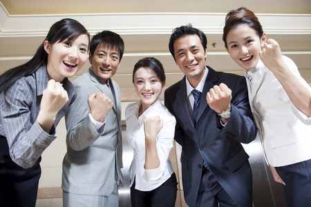 商务团队握拳加油照片