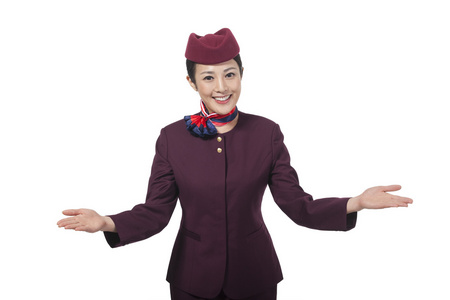 鞠躬礼仪棚拍年轻女服务员做手势照片