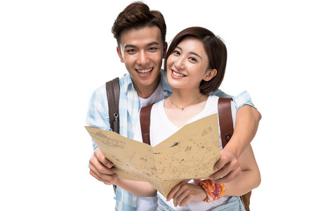 快乐的年轻情侣拿着地图快乐的年轻情侣拿着地图棚拍年轻男女医生多元