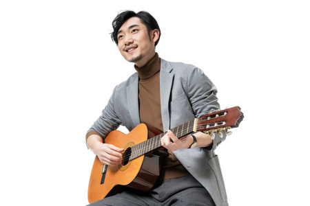 吉他弹唱图片