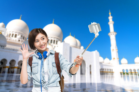 自拍杆拍照图片